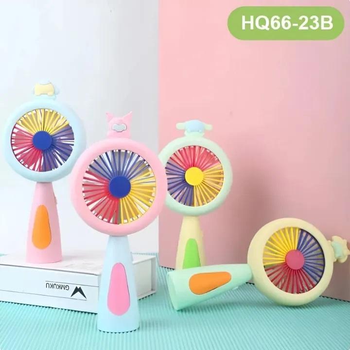 Colorful handheld fans with a gradient pink to green background