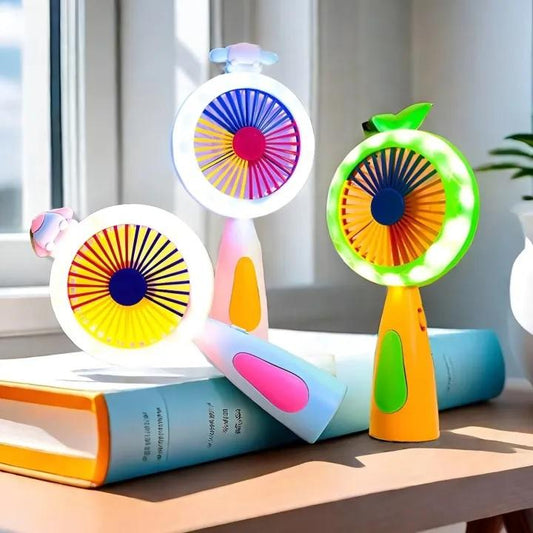 Colorful handheld fans on a table with a window in the background
